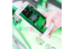 Image Person scanning QR code.